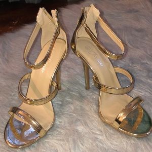 Gold high heels
